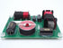 An assembled passive crossover for the HT-10 home theater speaker kit.