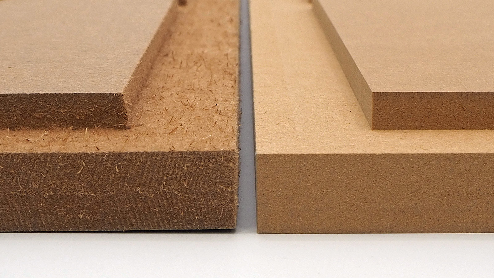 Comparison picture between Parts Express knock down cabinet and Denovo Audio flat pack.