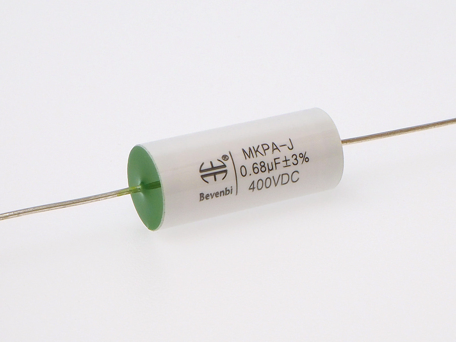 A Bevenbi .68uF MKPA-J capacitor with a white body, green end cap, and thin metal leads, shown on a clean white background.